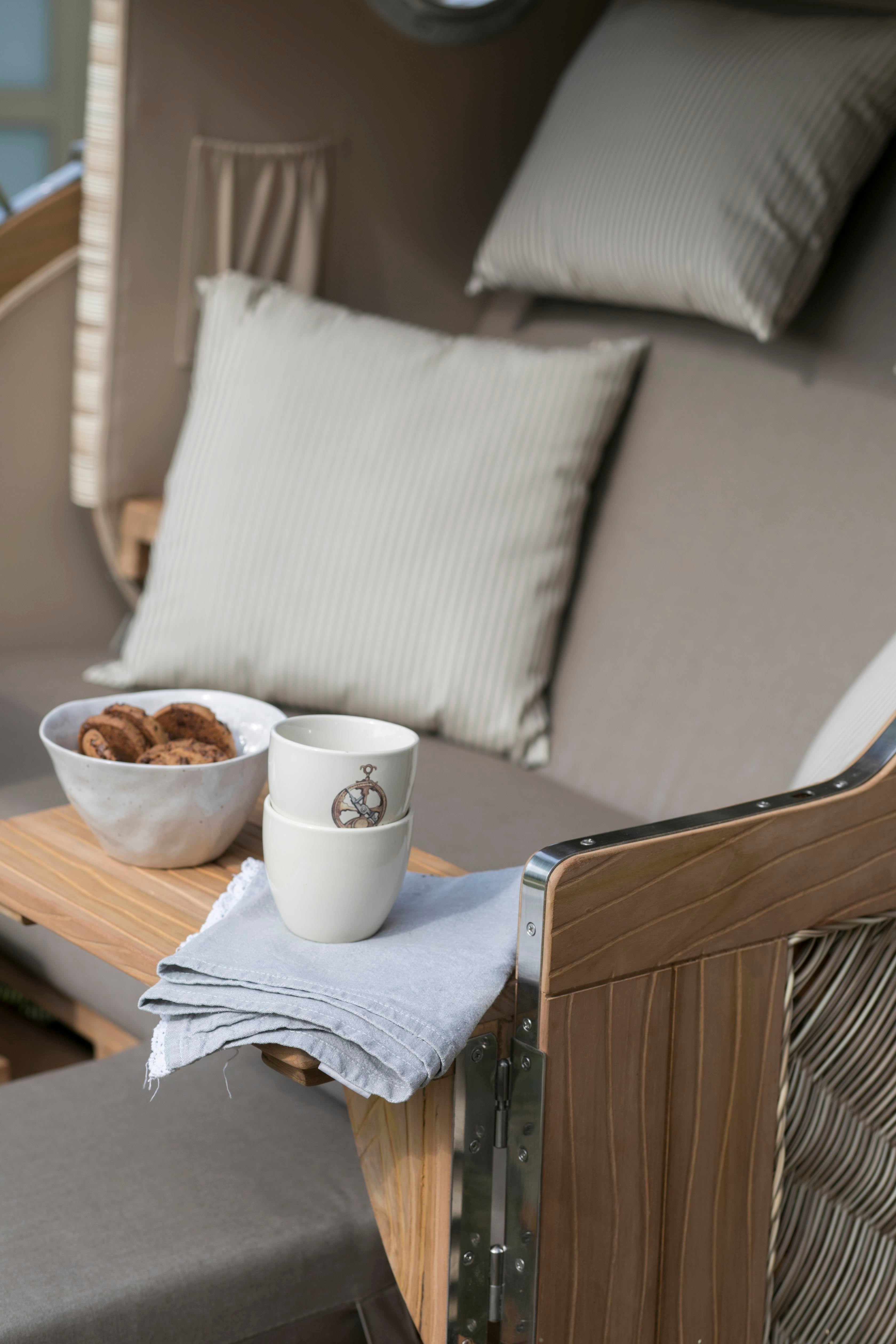 Strandkorb Düne Teak Bullauge Dessin 534 inkl. Feuerschale IDAHO