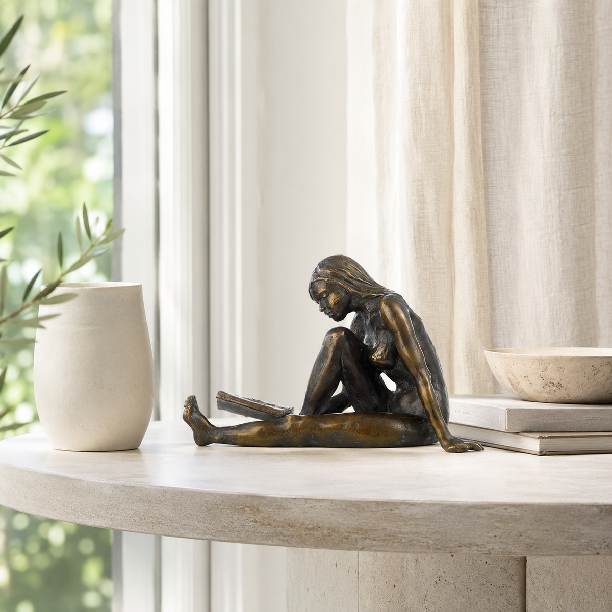 Birgit Stauch: Skulptur "Die Lesende" Metallguss